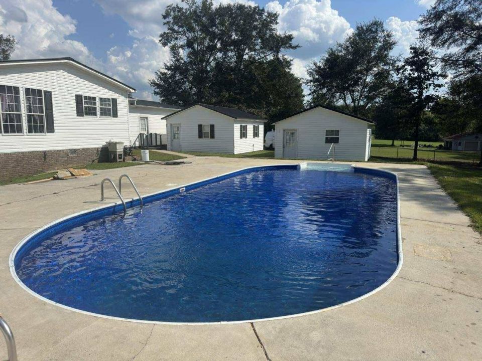 Oval Pool with a New Navarre Liner